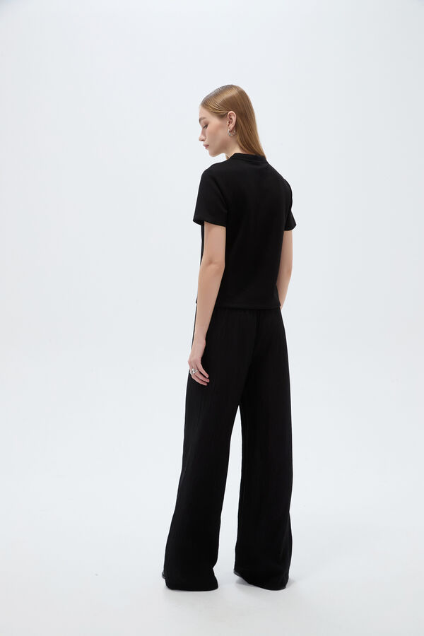 REMERA POIT 70809 NEGRO image number null