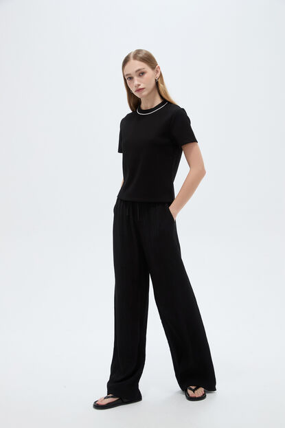 REMERA POIT 70809 NEGRO image number null