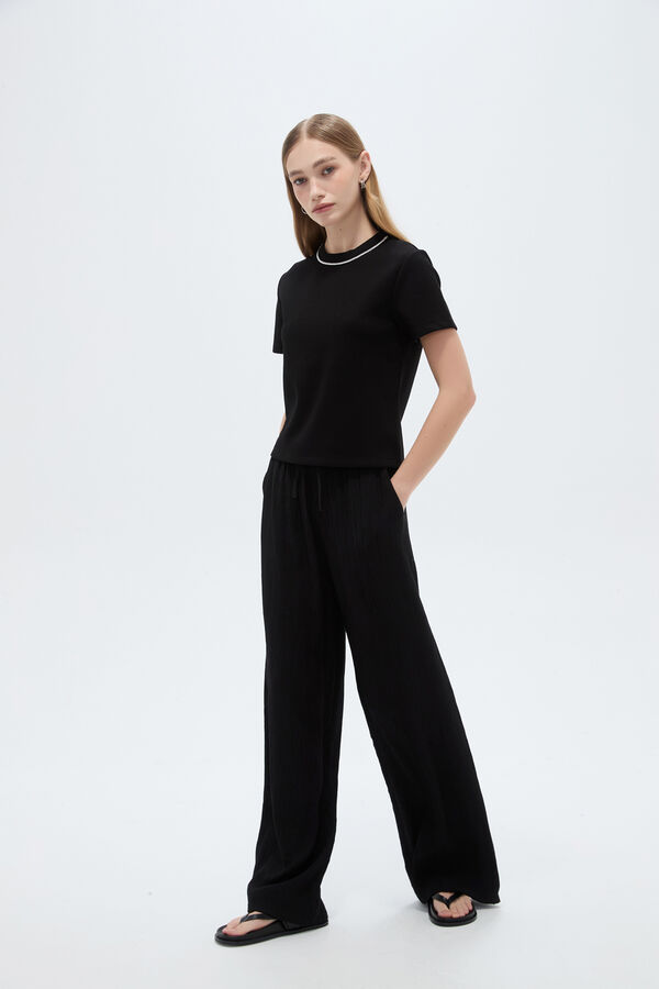 REMERA POIT 70809 NEGRO image number null